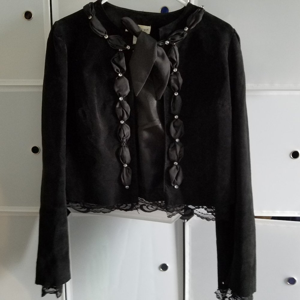 Jacket. Genuine leather. Lace and at jacket and sleeve hems.